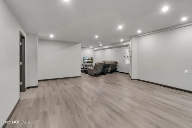 a balcony with table and chairs