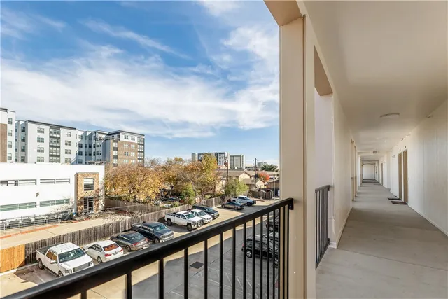 a view of a balcony with city view