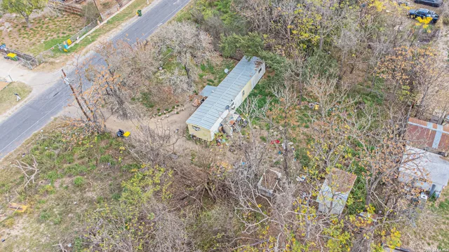 a view of water pond with lots of trees