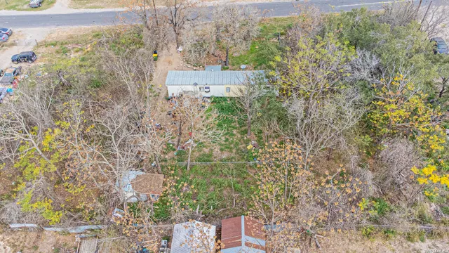 a view of a forest from a balcony