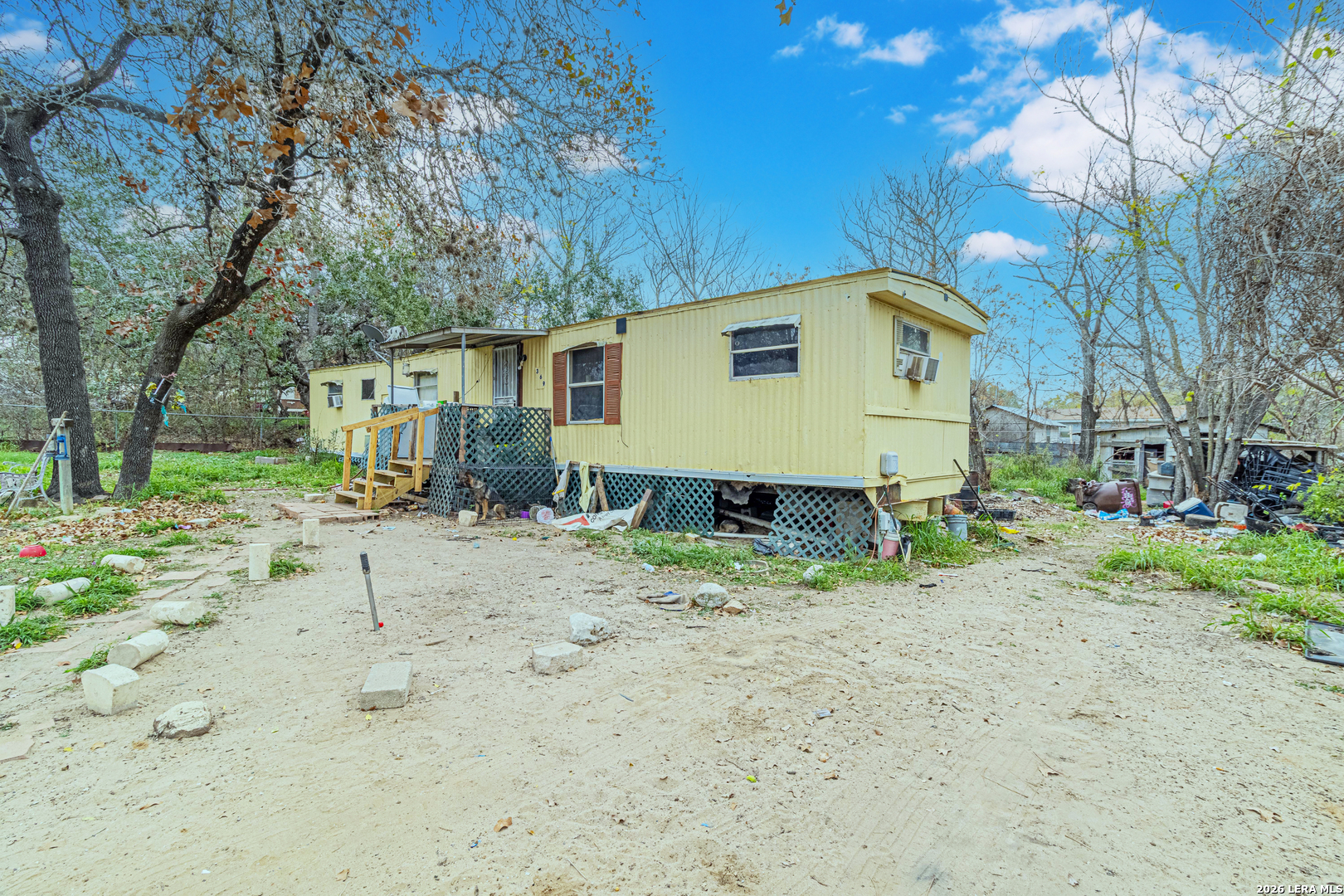 369 Gateway Drive Poteet, TX 78065 - Photo 30 of 45 a view of a house with a yard