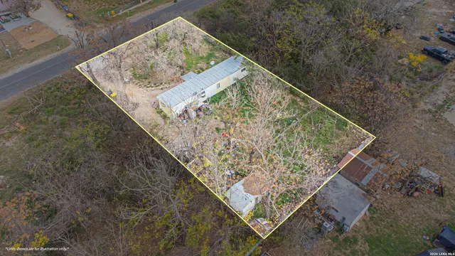 a view of a tree with a yard