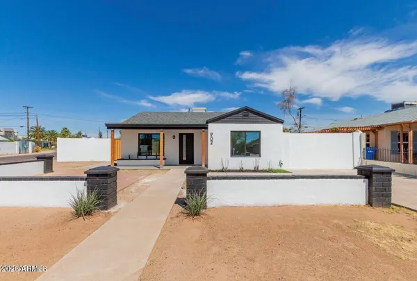 front view of a house with a patio