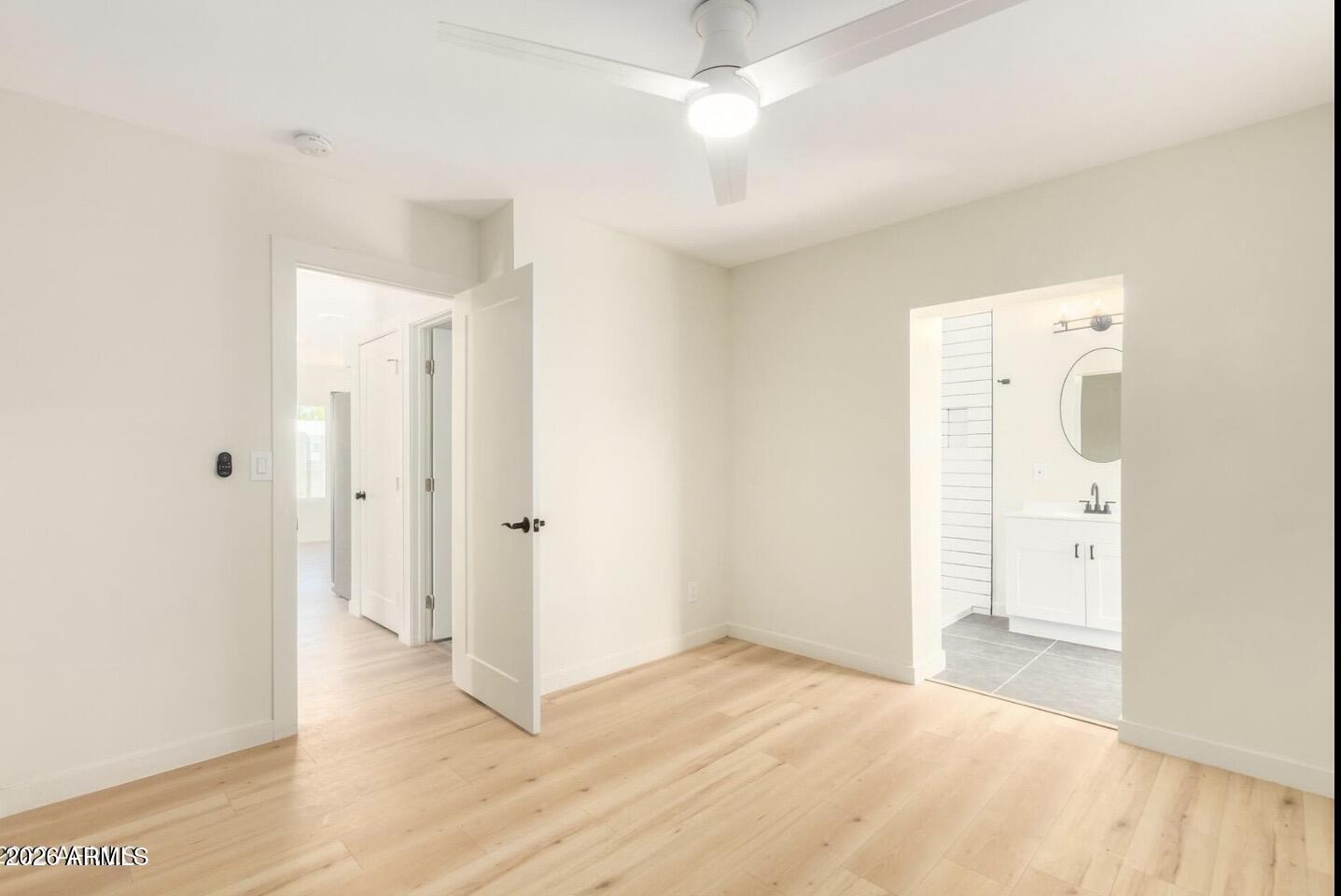 902 East Fairmount Avenue Phoenix, AZ 85014 - Photo 21 of 28 a view of a room with wooden floor