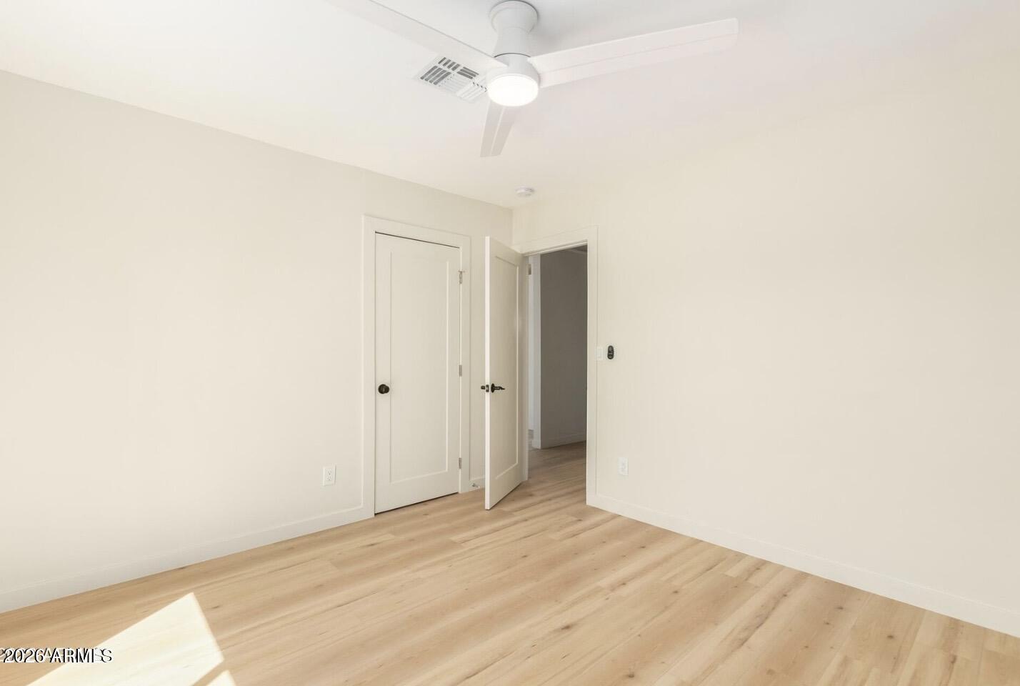 902 East Fairmount Avenue Phoenix, AZ 85014 - Photo 23 of 28 a view of a room with a ceiling fan and a shower