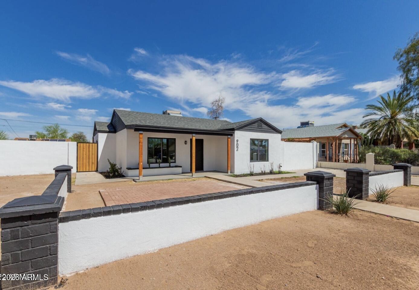 902 East Fairmount Avenue Phoenix, AZ 85014 - Photo 7 of 28 a house view with a sitting space and garden