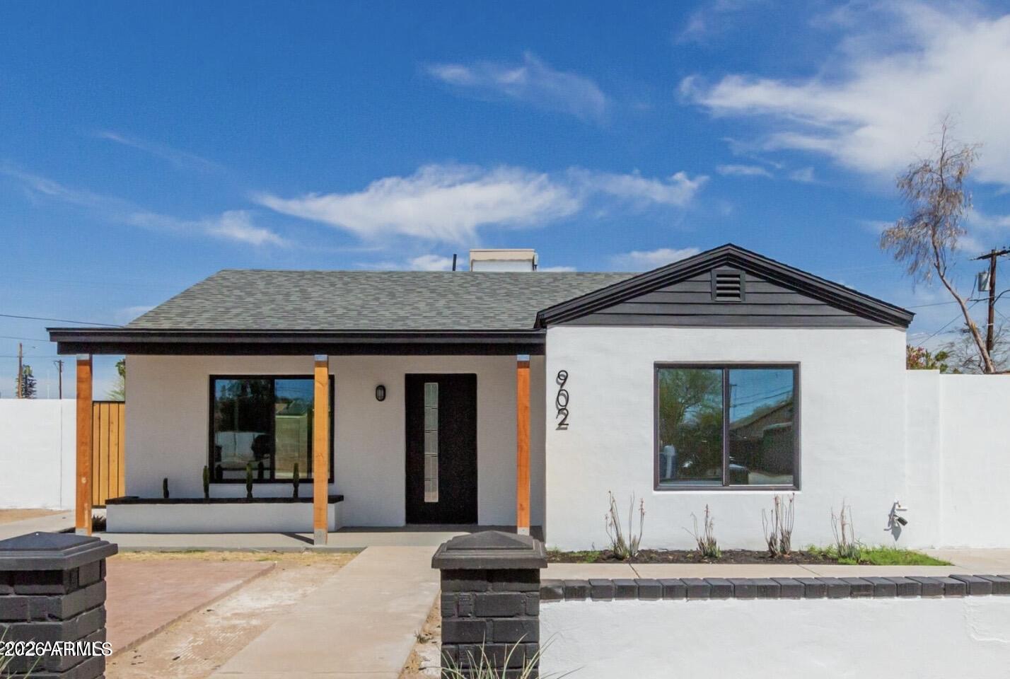 902 East Fairmount Avenue Phoenix, AZ 85014 - Photo 8 of 28 a front view of a house with garden