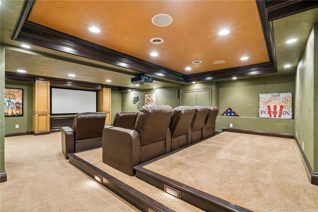 12288 Carmichael Circle Irwin, PA 15642 - Photo 34 of 49 Theater room with 2 tier seating for 9.