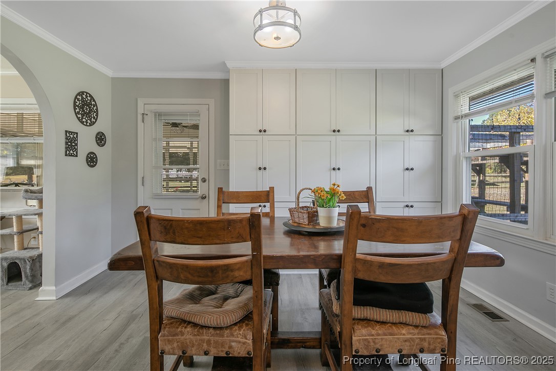 7666 Overhills Road Spring Lake, NC 28390 - Photo 14 of 50 a dining room with furniture and window