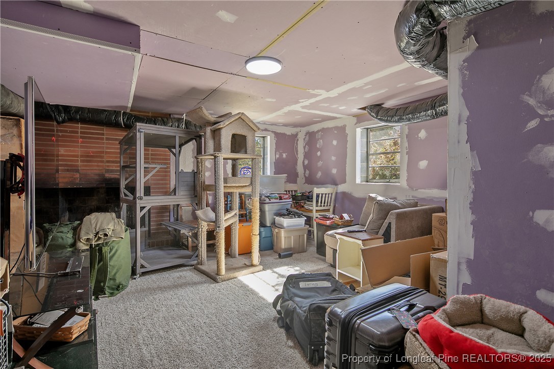 7666 Overhills Road Spring Lake, NC 28390 - Photo 43 of 50 a living room with furniture and a window