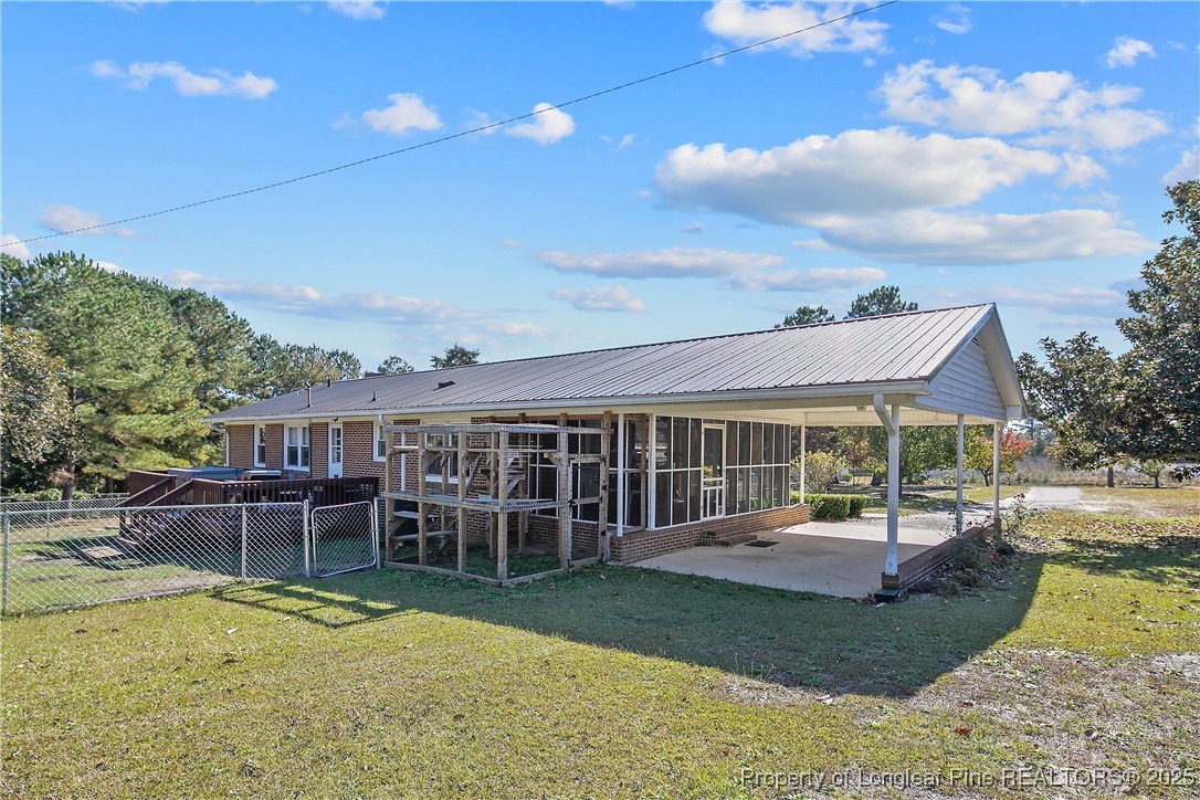 7666 Overhills Road Spring Lake, NC 28390 - Photo 46 of 50 front view of a house with a yard