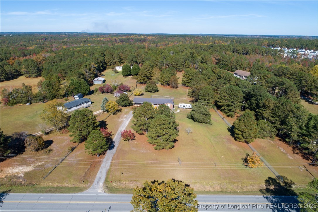7666 Overhills Road Spring Lake, NC 28390 - Photo 49 of 50 an aerial view of a houses with yard