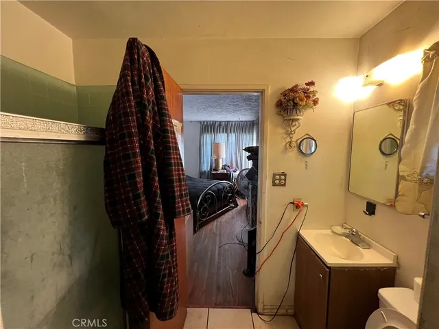 a bathroom with a sink and mirror