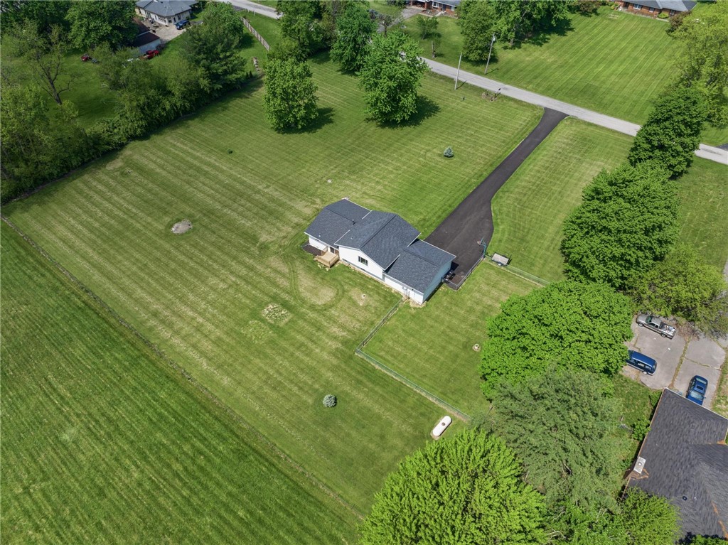 1353 Foust Road Xenia, OH 45385 - Photo 15 of 50 Expansive green grounds surround this charming residence, offering tranquil outdoor living.