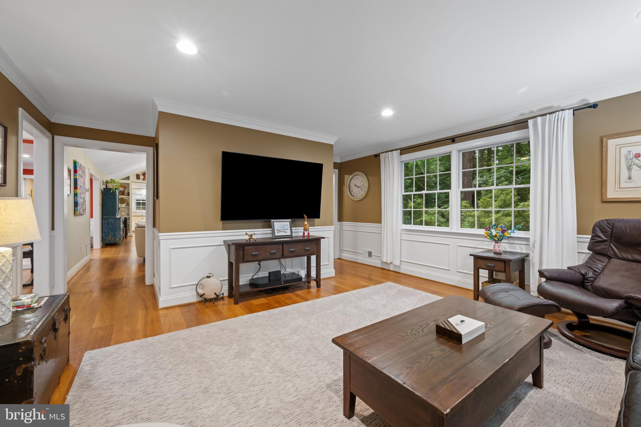 901 Navy Road Baltimore, MD 21204 - Photo 15 of 40 a living room with furniture and a flat screen tv
