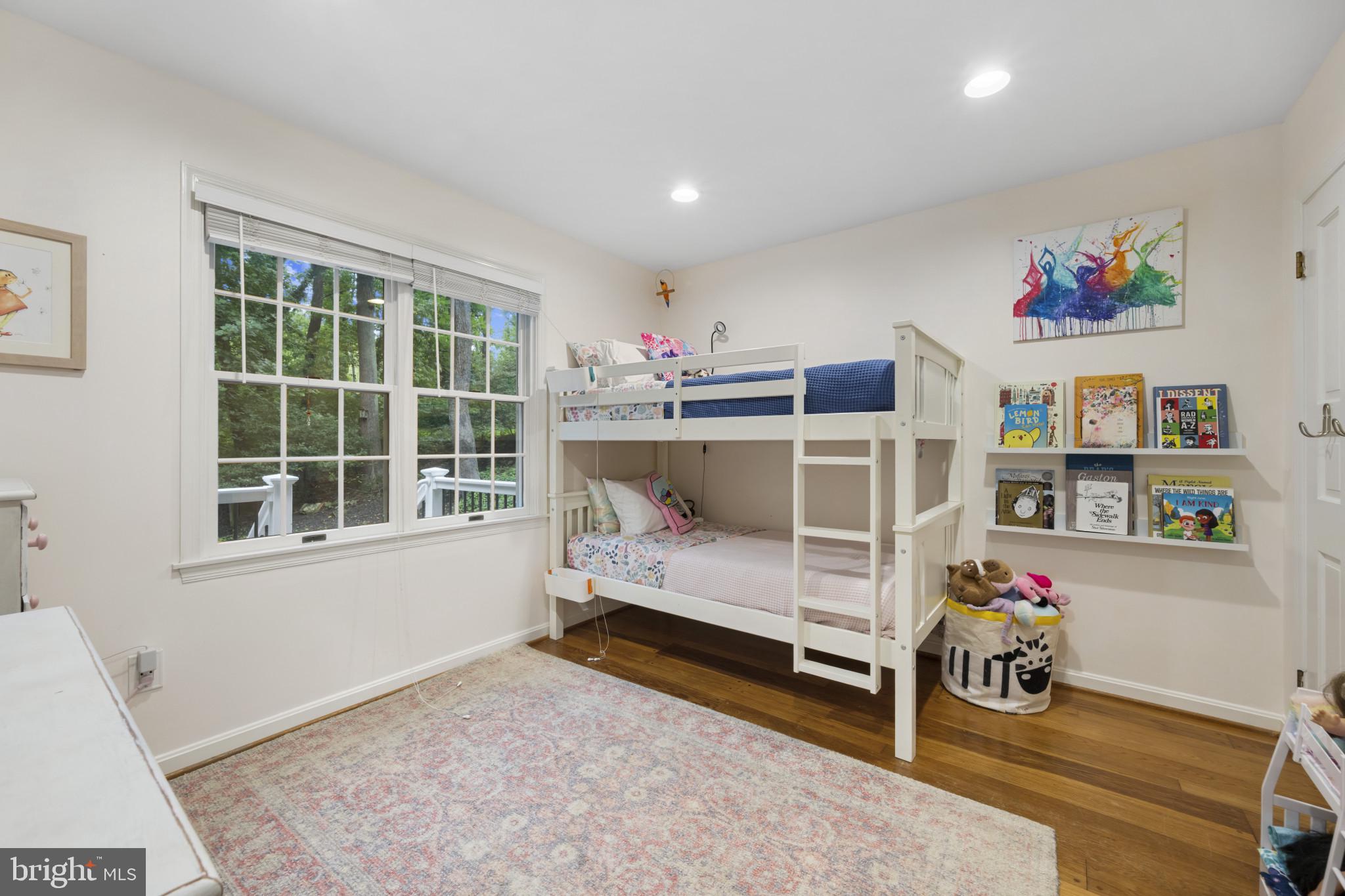 901 Navy Road Baltimore, MD 21204 - Photo 18 of 40 a bedroom with furniture and a window