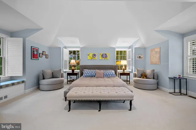 a picture of a bench in front of a window