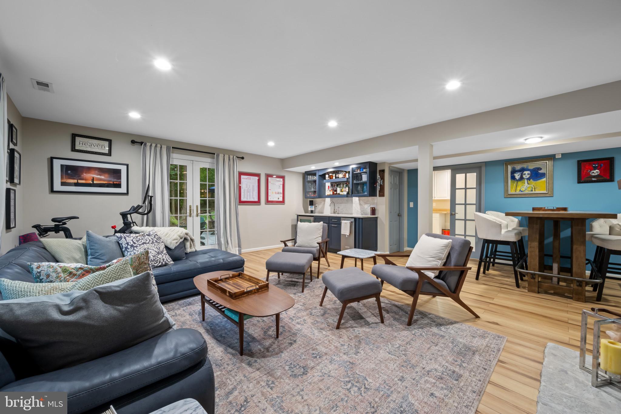 901 Navy Road Baltimore, MD 21204 - Photo 25 of 40 a living room with furniture and wooden floor