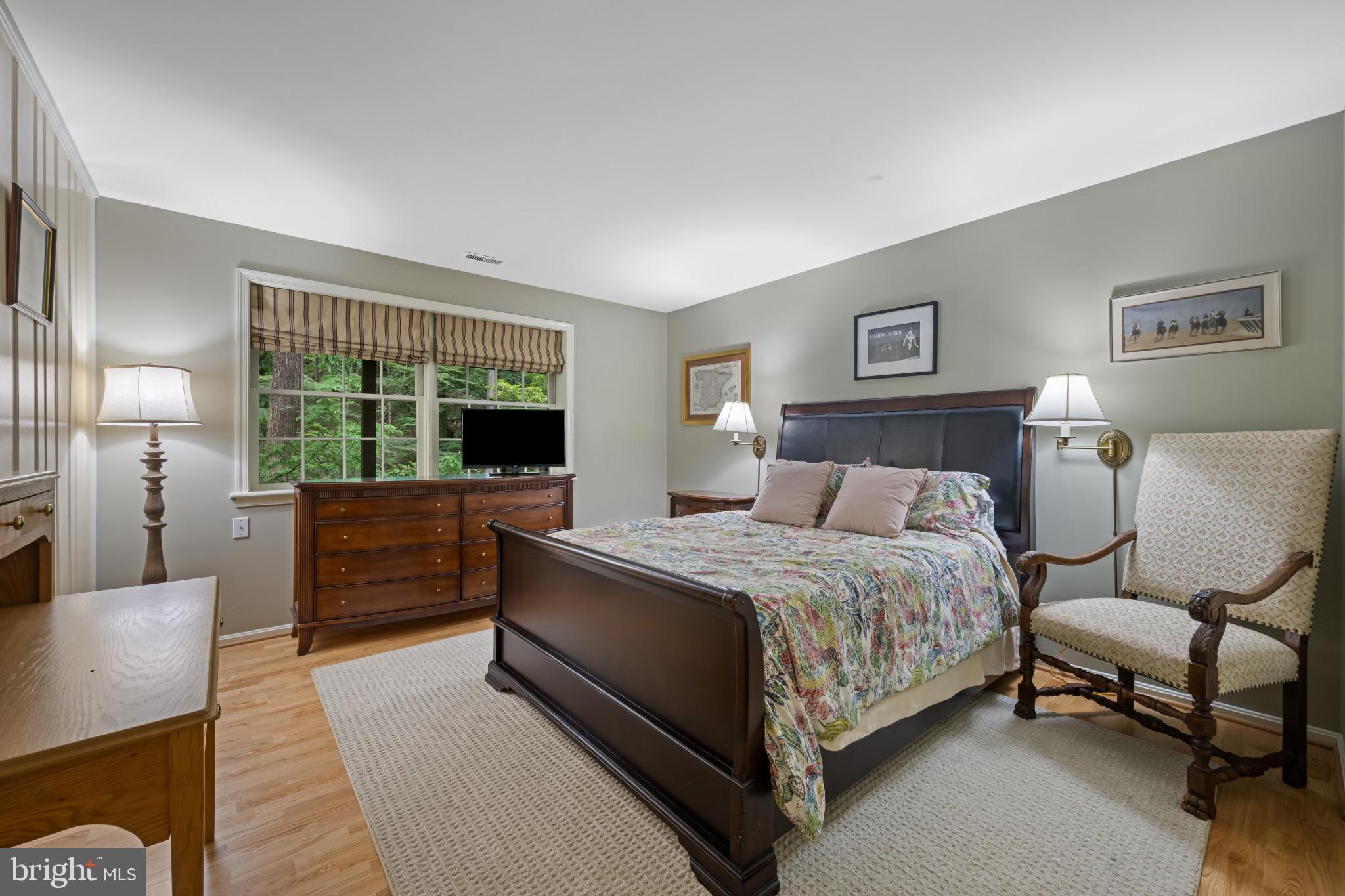 901 Navy Road Baltimore, MD 21204 - Photo 29 of 40 a bedroom with a bed and a couch