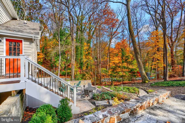 a bathroom with a sink mirror toilet and bathtub