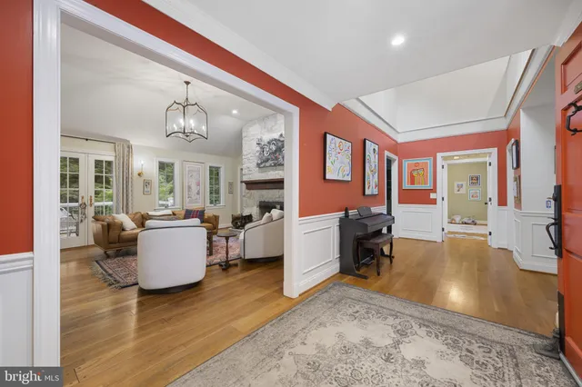 a view of entryway with stairs and wooden floor
