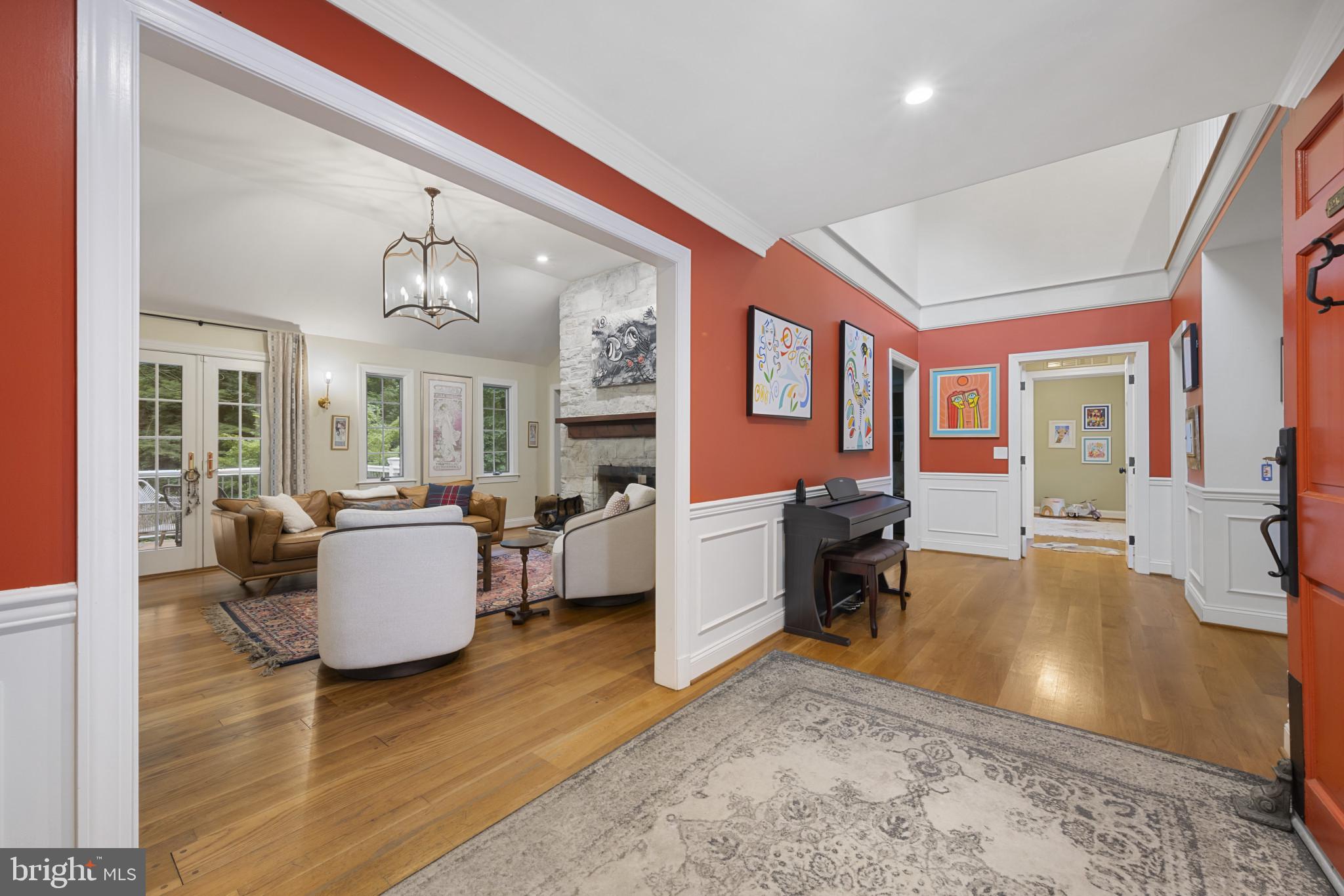 901 Navy Road Baltimore, MD 21204 - Photo 5 of 40 a living room with furniture and wooden floor