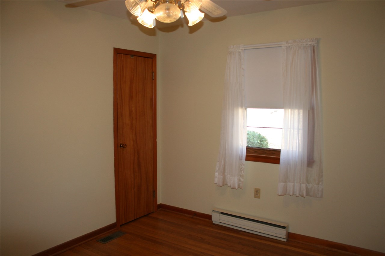 3138 Beautiful Run Road Orange, VA 22960 - Photo 9 of 13 an empty room with wooden floor and windows
