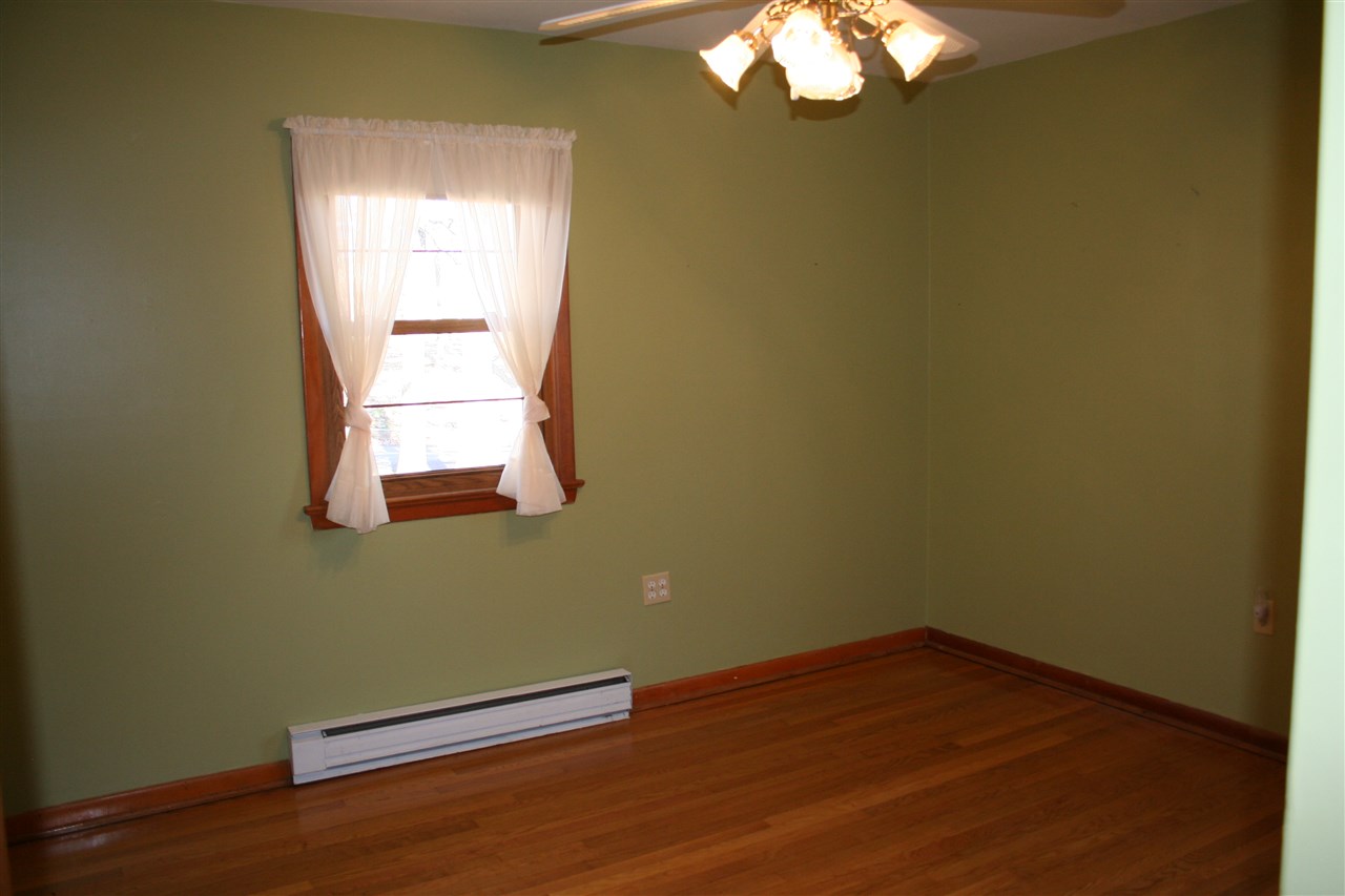 3138 Beautiful Run Road Orange, VA 22960 - Photo 10 of 13 an empty room with wooden floor and windows