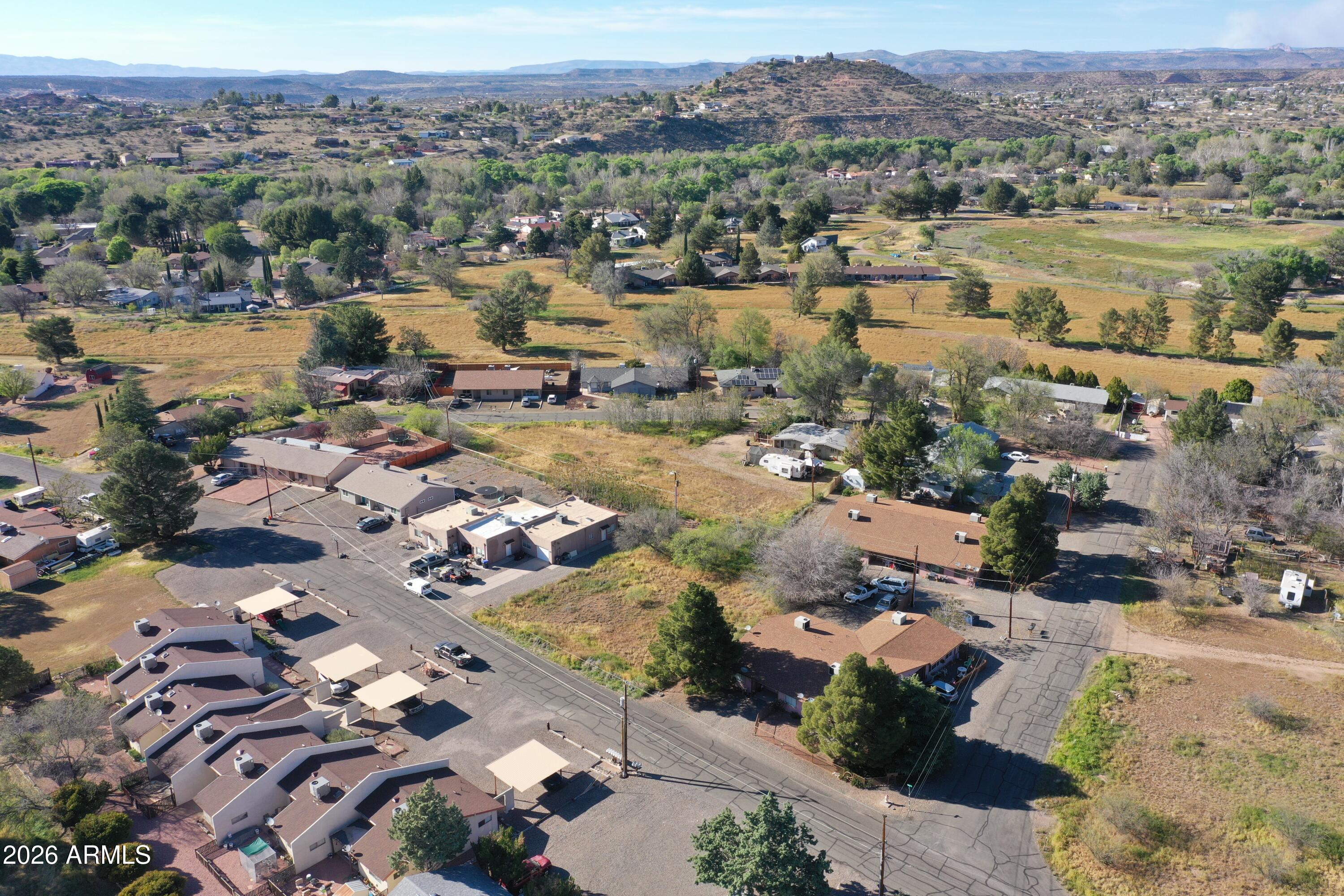 3980 East Valley Lane, Unit 32 Rimrock, AZ 86335 - Photo 8 of 11 an aerial view of ocean and residential houses with outdoor space