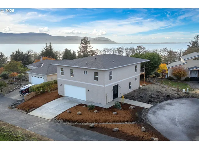 a view of a swimming pool with a yard