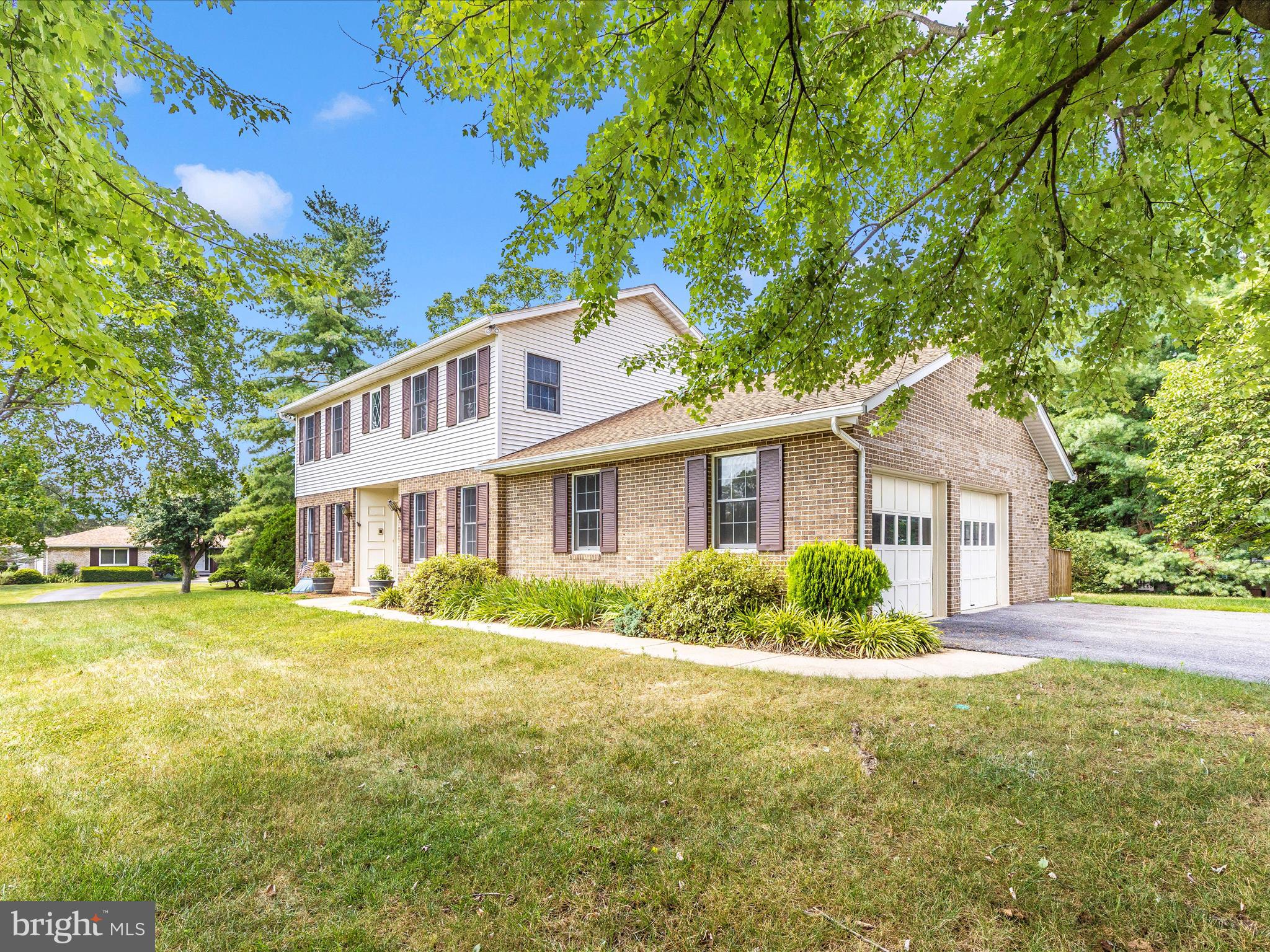8107 Clearfield Road Frederick, MD 21702 - Photo 49 of 52 a front view of a house with a yard