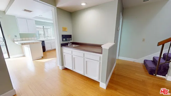 a view of livingroom with furniture wooden floor and window