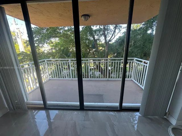 a view of a porch with a chair