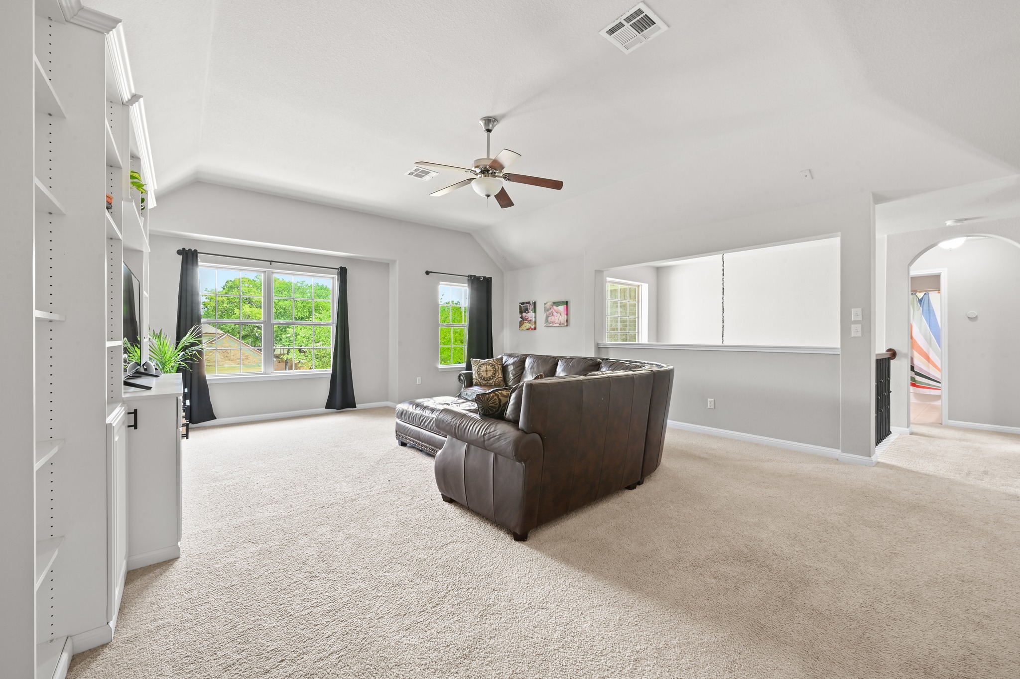 194 Treehaven Court Buda, TX 78610 - Photo 19 of 37 a living room with furniture and a large window