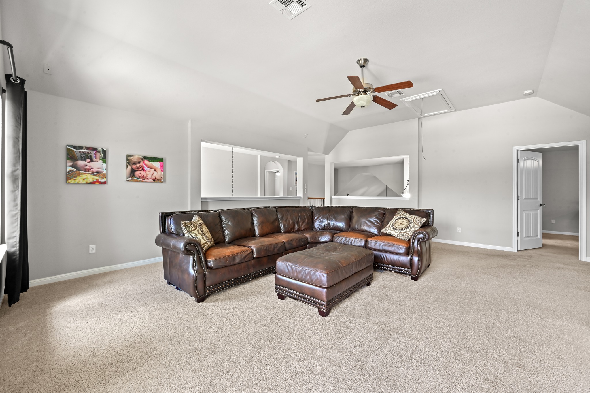 194 Treehaven Court Buda, TX 78610 - Photo 21 of 37 a living room with furniture and a ceiling fan
