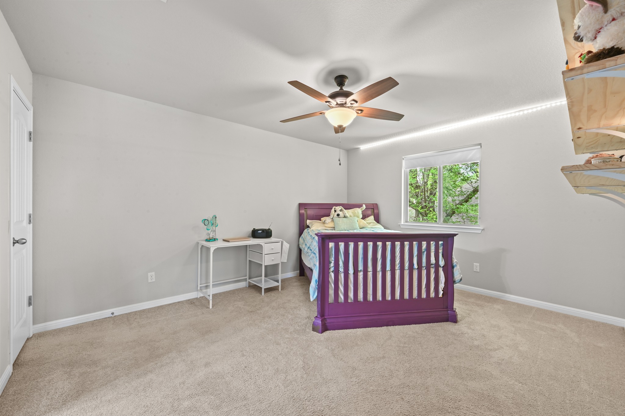 194 Treehaven Court Buda, TX 78610 - Photo 26 of 37 a bedroom with a bed and window