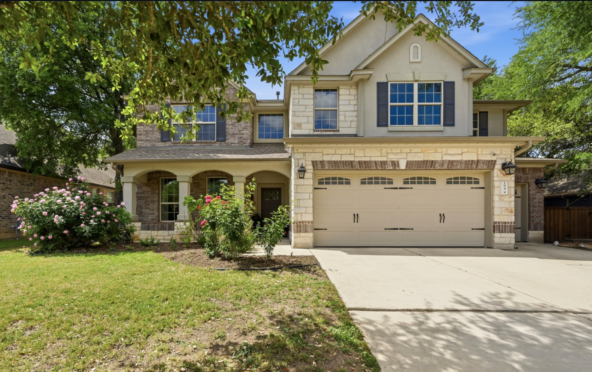 194 Treehaven Court Buda, TX 78610 - Photo 35 of 37 a front view of a house with a yard