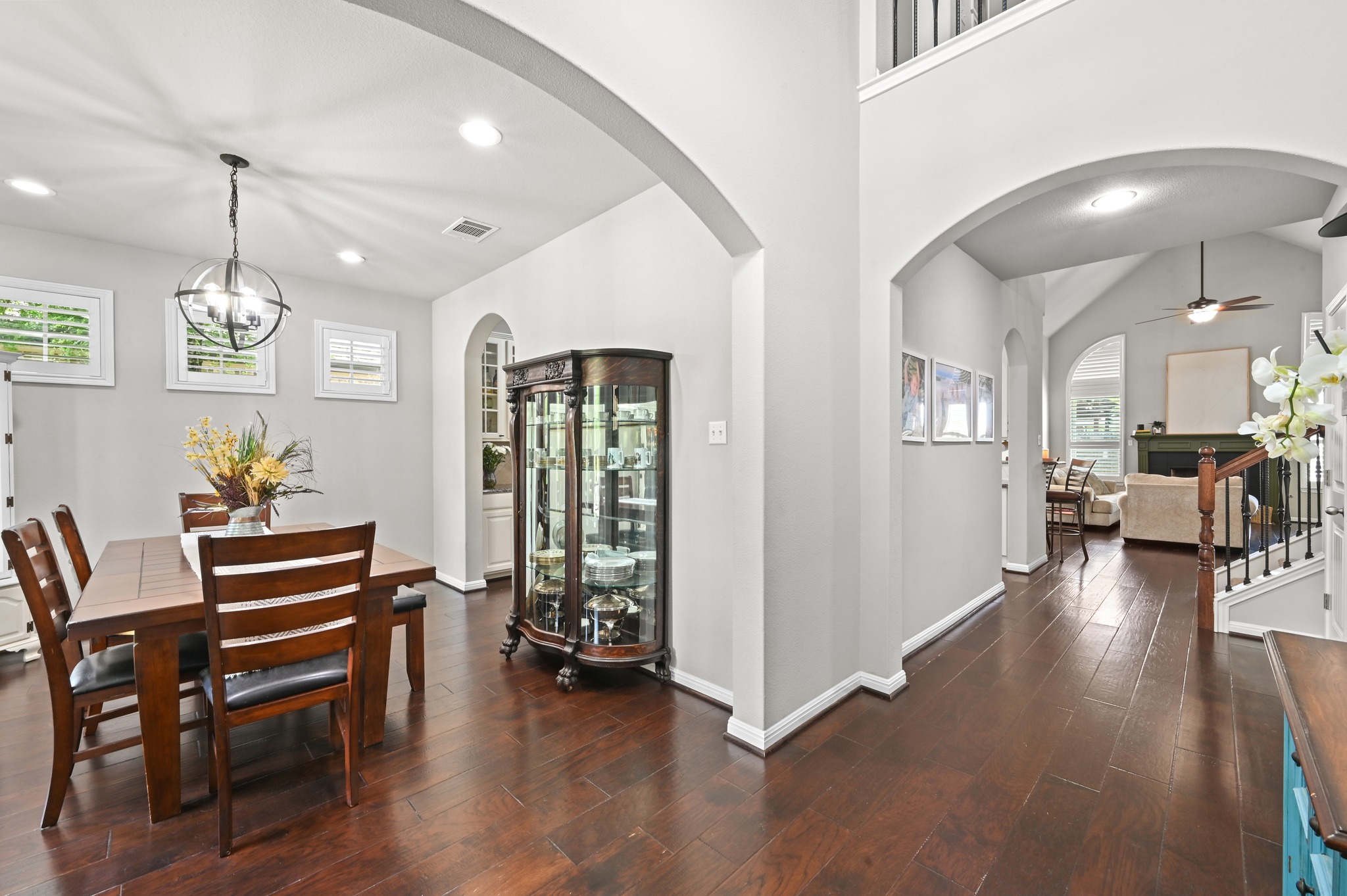 194 Treehaven Court Buda, TX 78610 - Photo 6 of 37 a view of a dining room with furniture and wooden floor