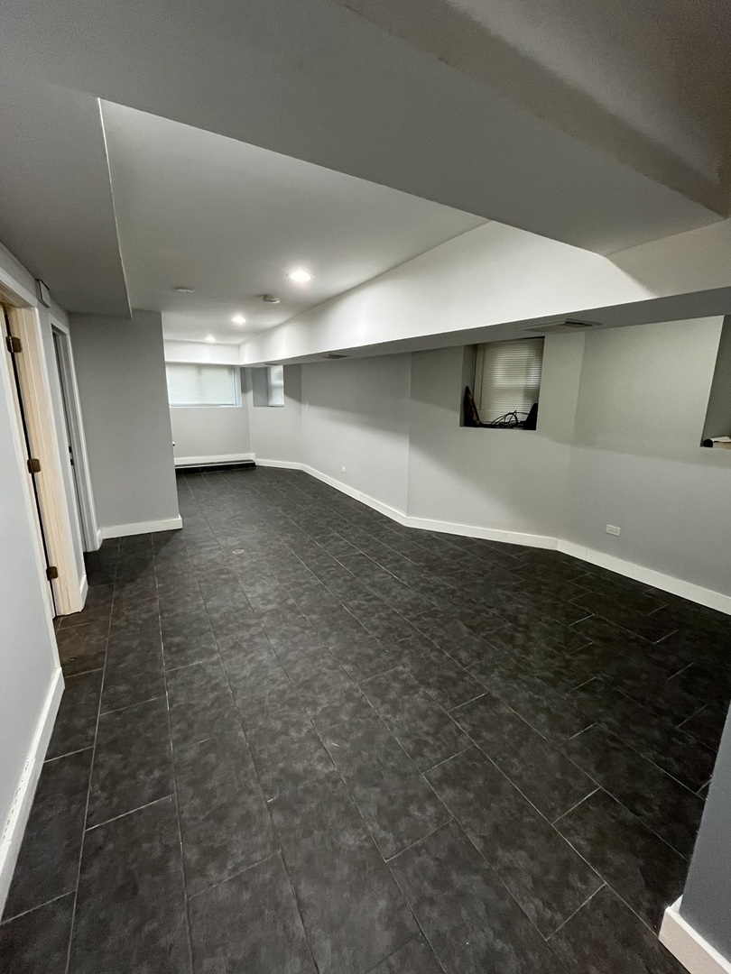 1922 South Springfield Avenue, Unit G Chicago, IL 60623 - Photo 4 of 10 a view of a car garage