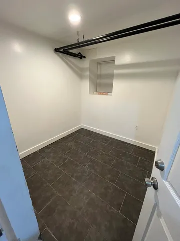 a view of a room with racks on the wall