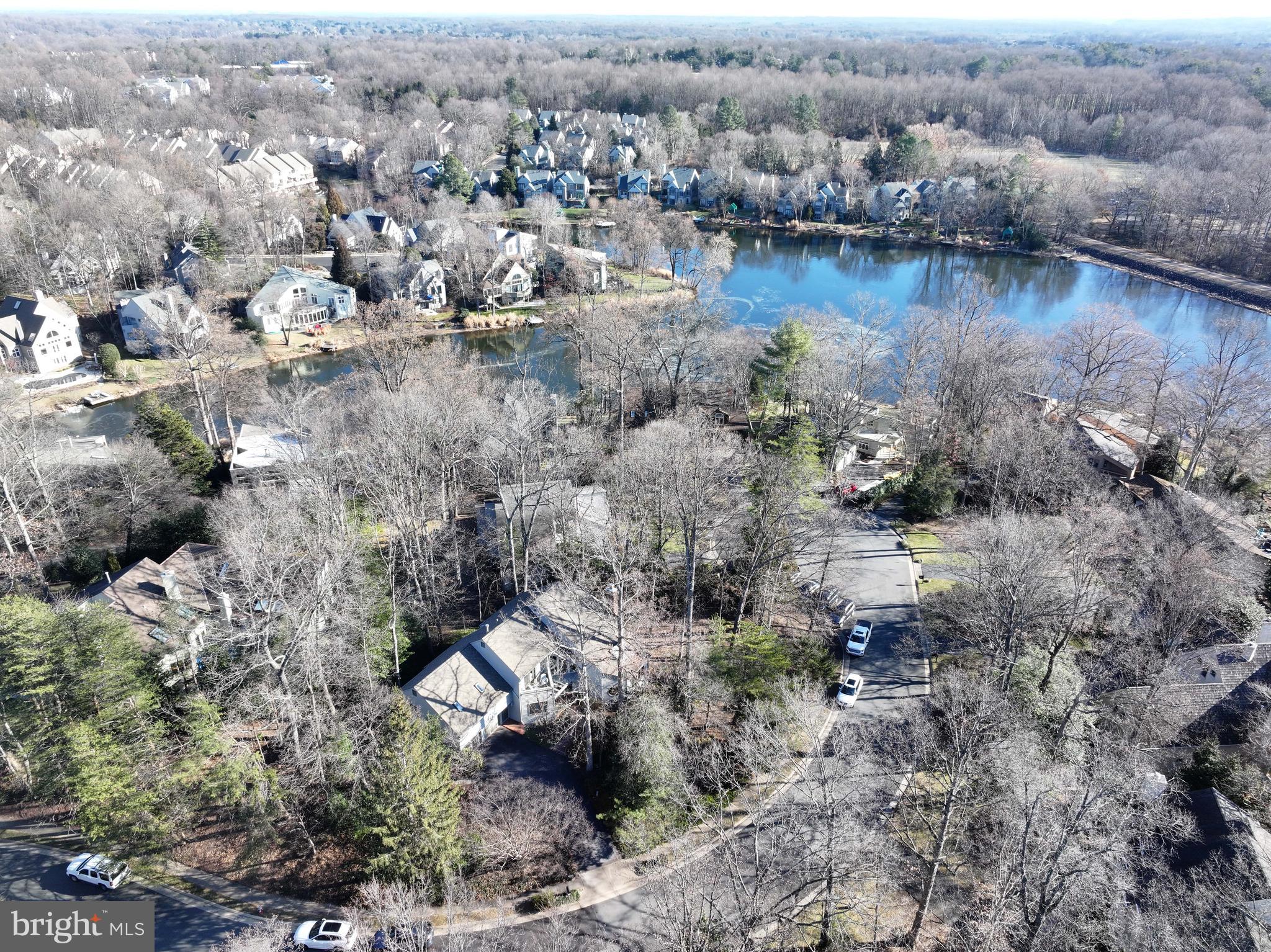 11574 Lake Newport Road Reston, VA 20194 - Photo 3 of 63 an aerial view of a houses with a lake view