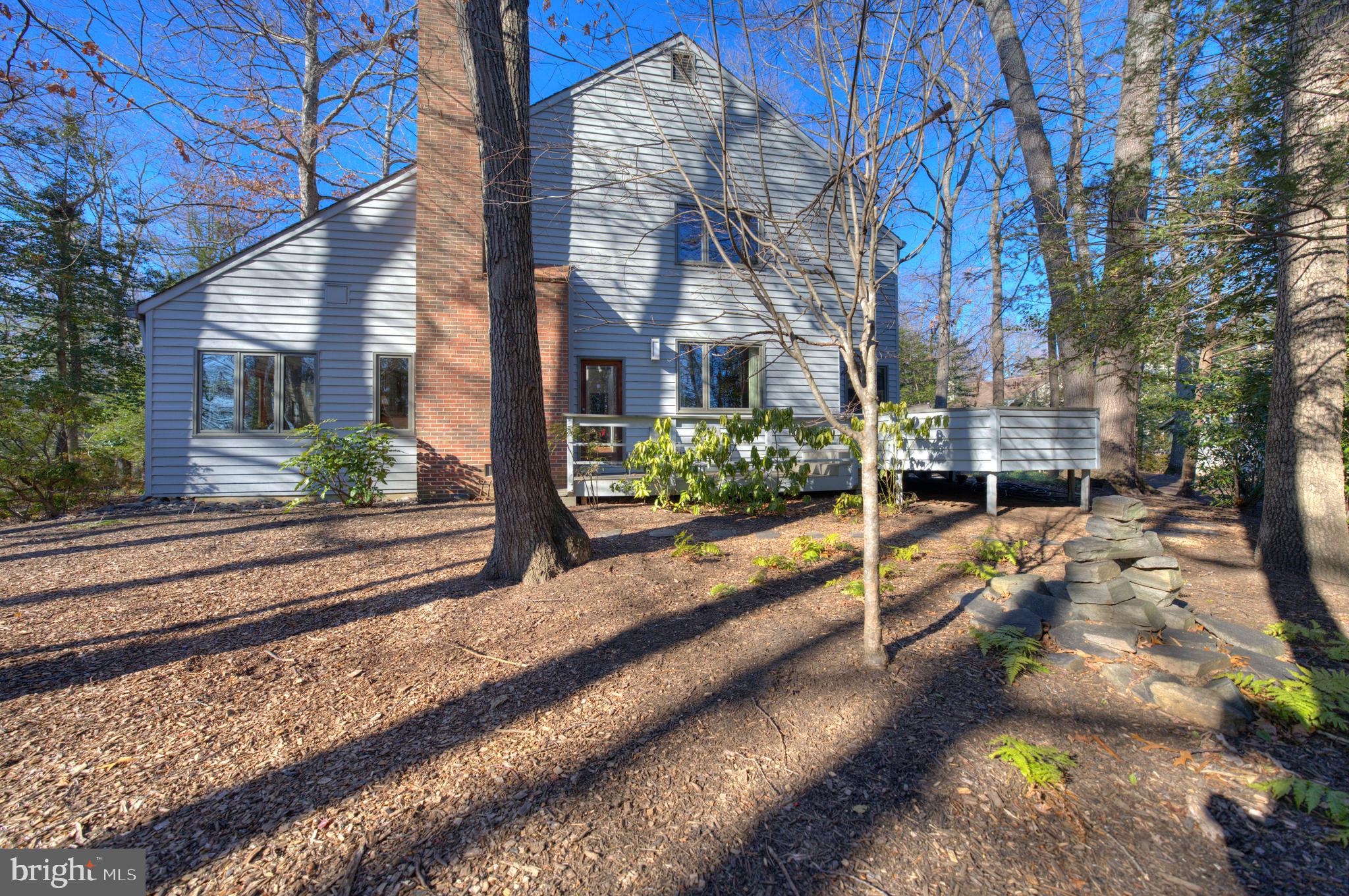 11574 Lake Newport Road Reston, VA 20194 - Photo 7 of 63 a view of a house with a yard and street view