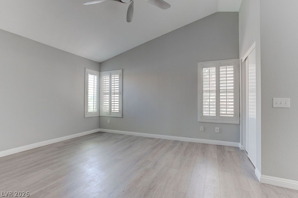 1416 Walstone Road North Las Vegas, NV 89031 - Photo 33 of 47 A quiet retreat with a soaring vaulted ceiling and natural light from shuttered windows.
