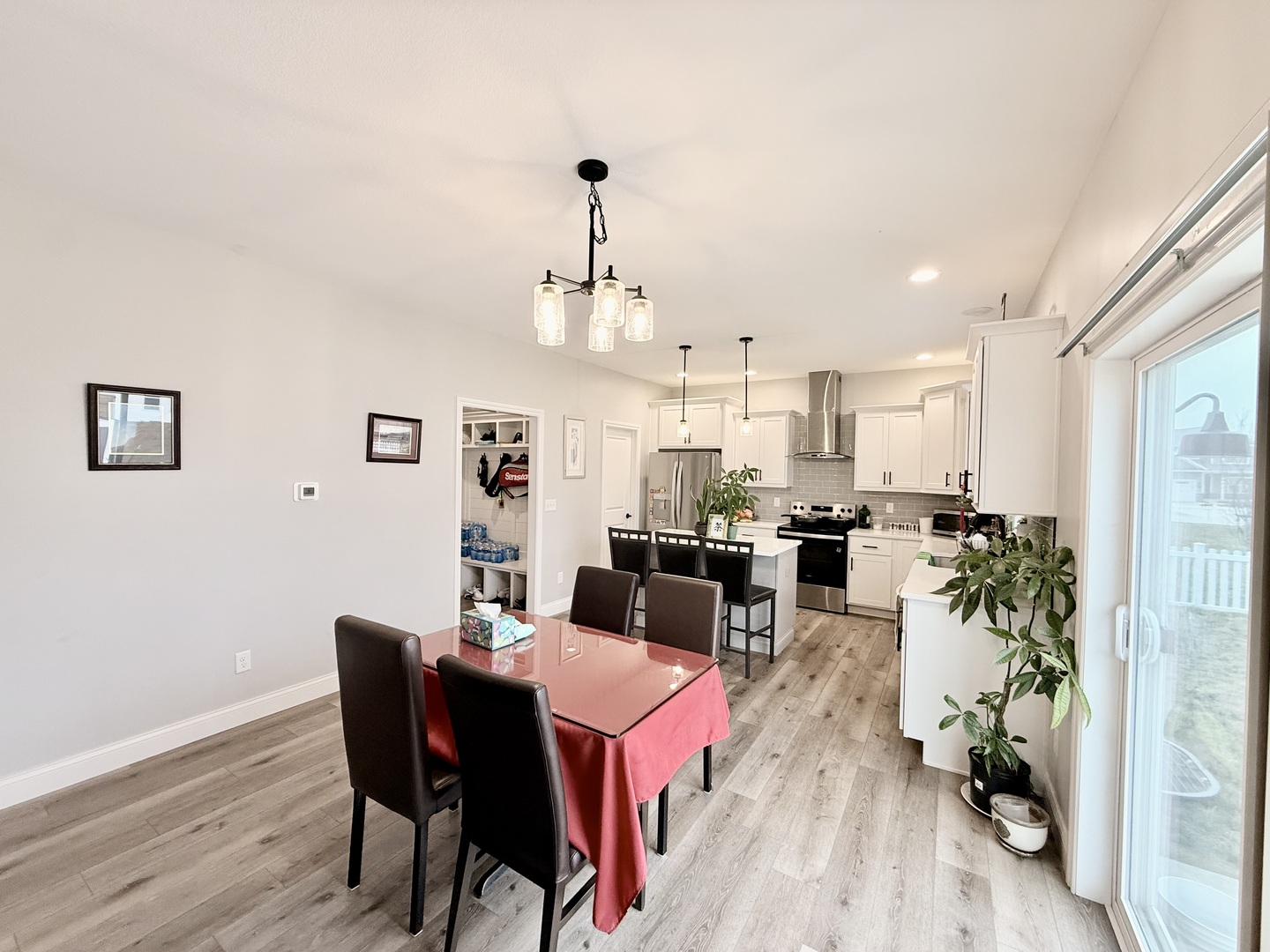 715 Rapp Drive Mahomet, IL 61853 - Photo 13 of 40 a view of a dining room with furniture and wooden floor