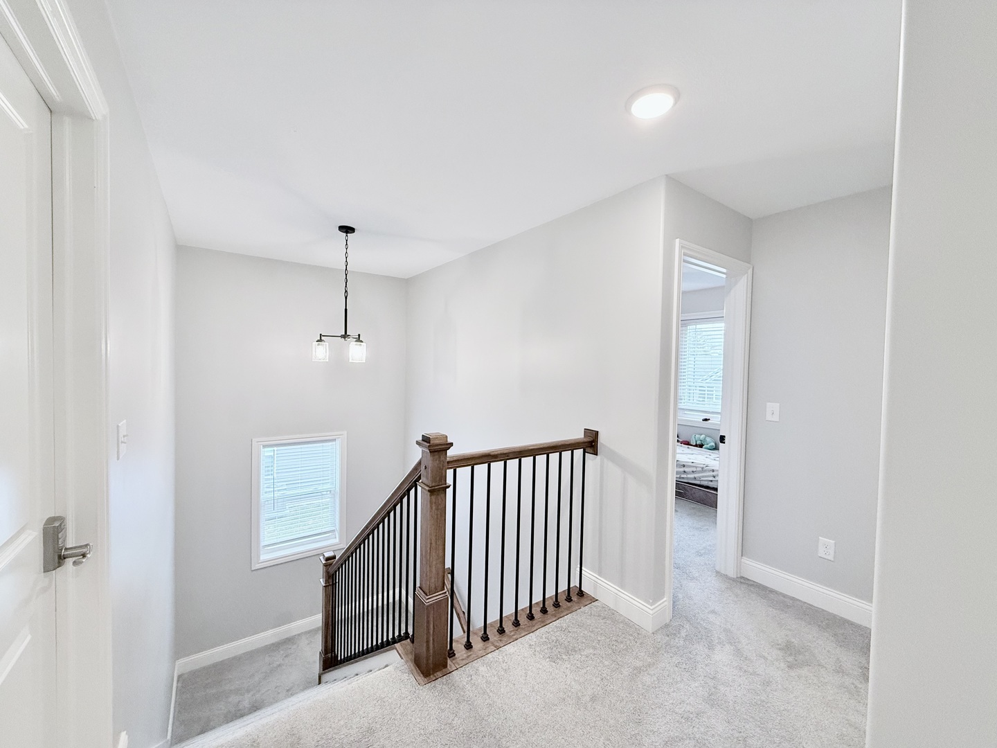 715 Rapp Drive Mahomet, IL 61853 - Photo 20 of 40 a view of a hallway to a bedroom