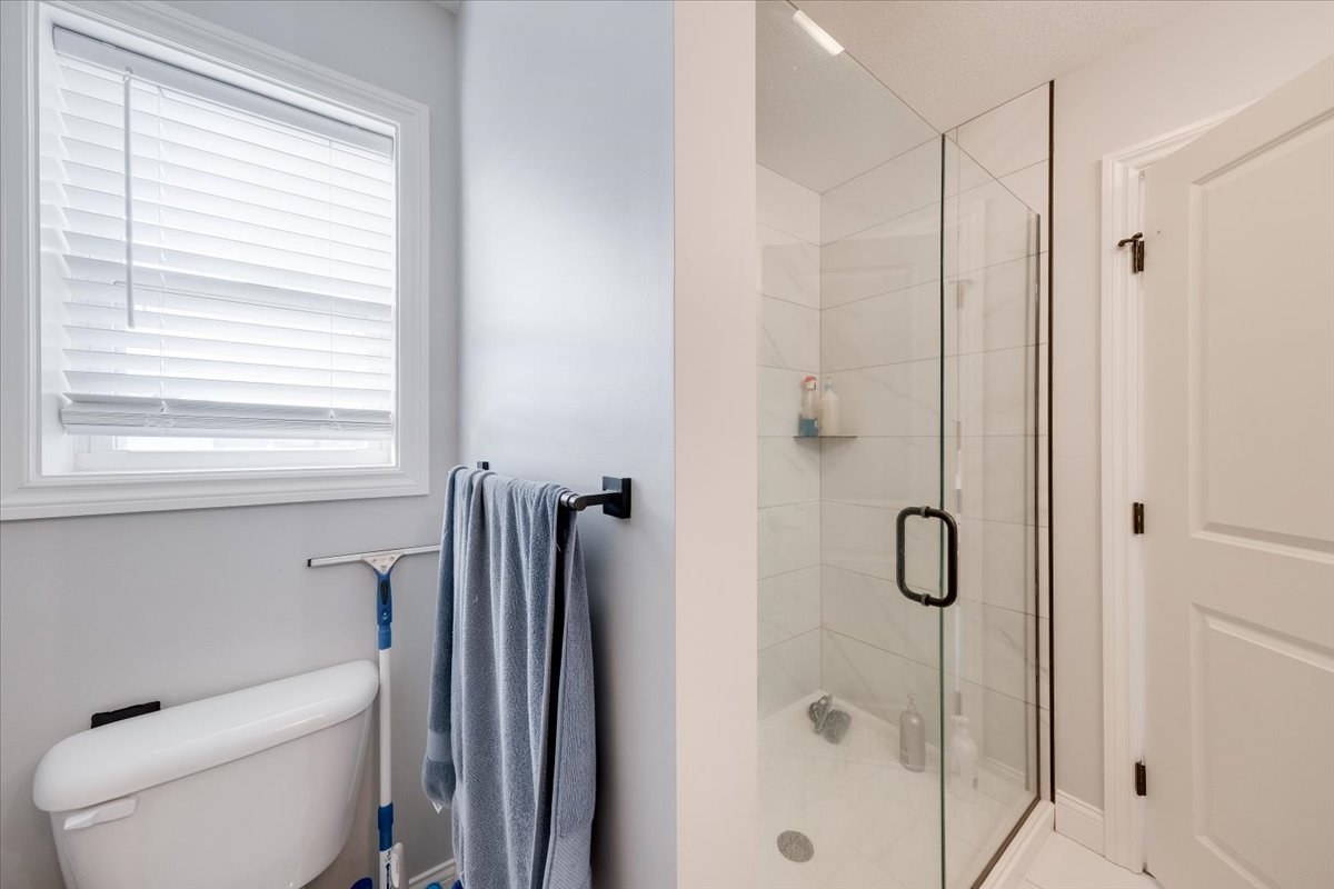 715 Rapp Drive Mahomet, IL 61853 - Photo 25 of 40 a bathroom with a shower and a toilet