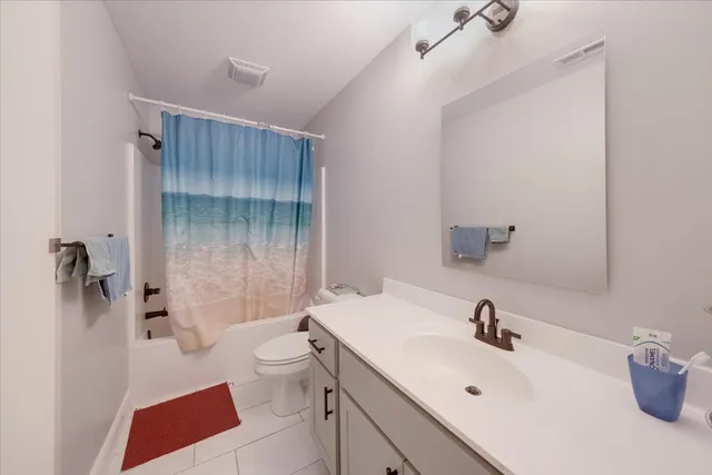 a room with a bed and a window