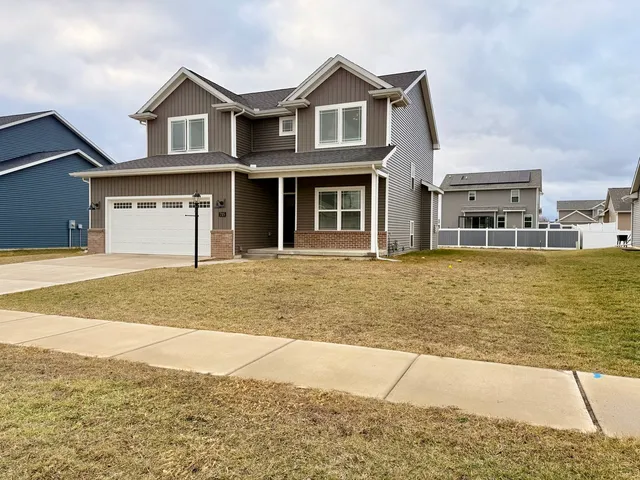 a front view of a house with swimming pool