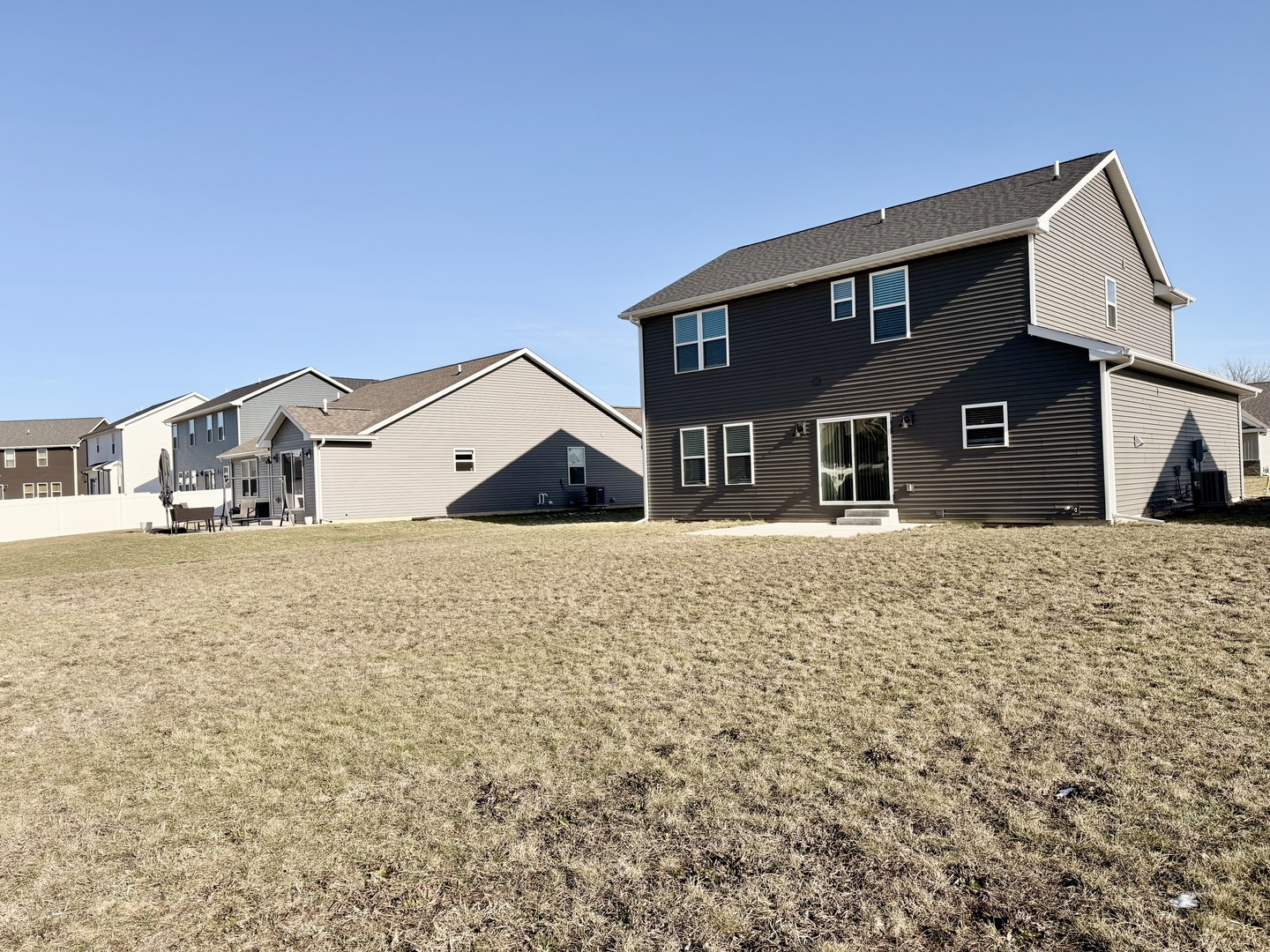 715 Rapp Drive Mahomet, IL 61853 - Photo 35 of 40 a front view of a house with large trees