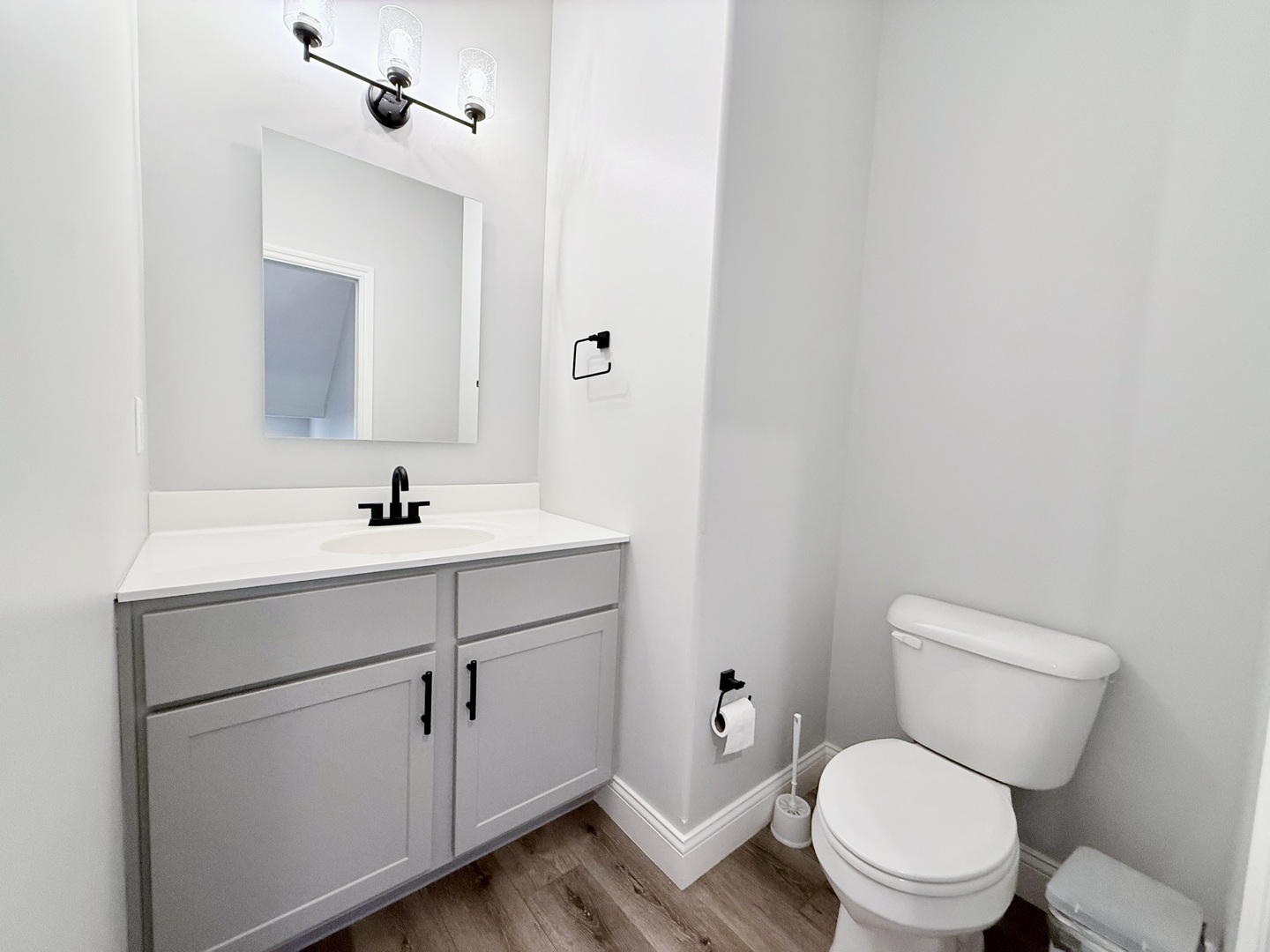715 Rapp Drive Mahomet, IL 61853 - Photo 7 of 40 a bathroom with a toilet sink and mirror